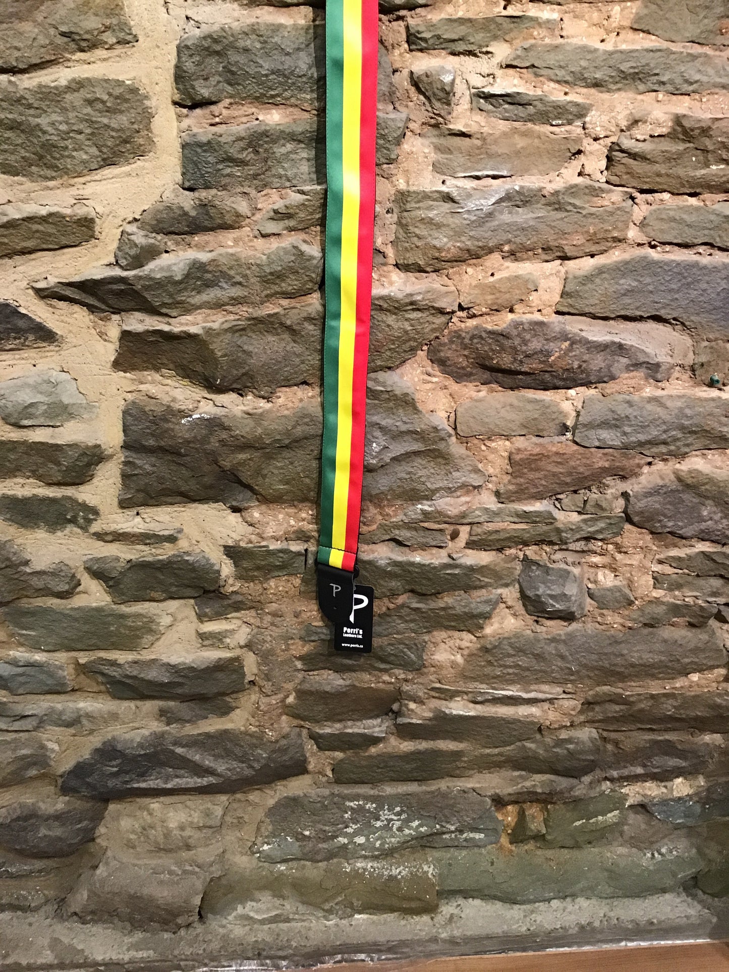 Perri’s Leathers 2” green, yellow, and red Rasta guitar strap