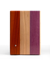 Solid padauk, cherry, and purple heart cajon with matching external snare.