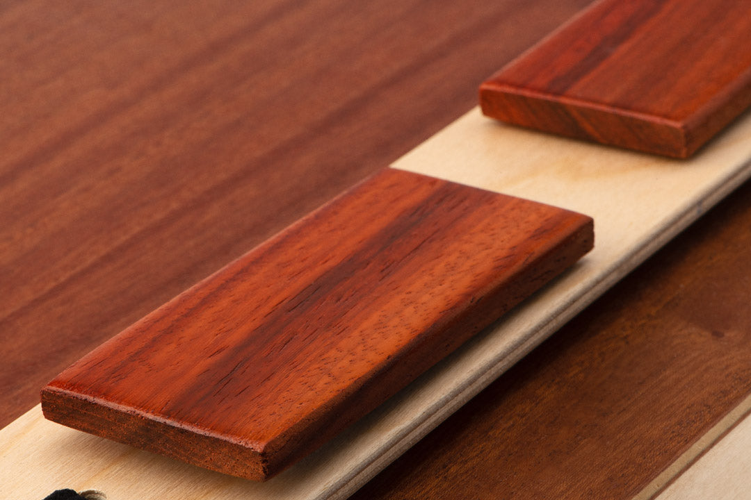 Par de castañuelas con caja Click - padauk macizo